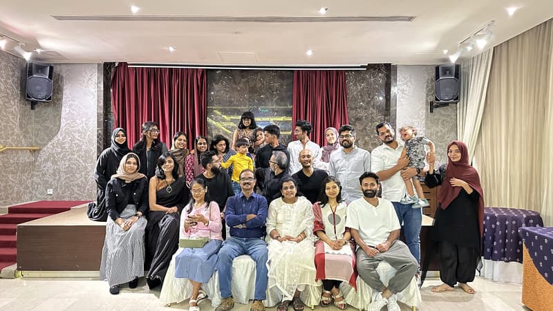 PAD team gathering during a studio event.